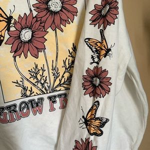 Large Butterfly and flowers “Grow Freely” light sweater
